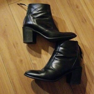 Black leather booties.